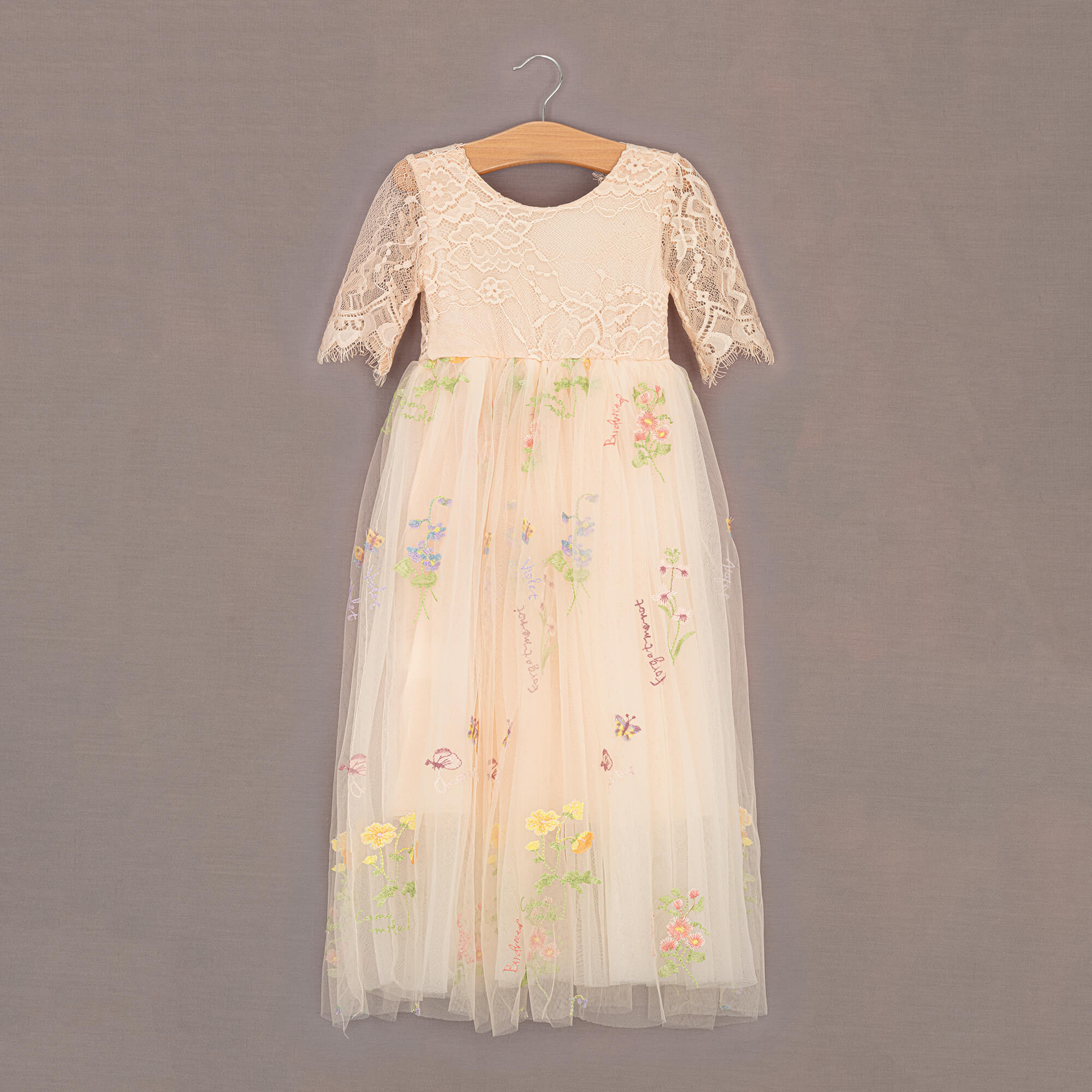 Apricot dress with embroidery detail