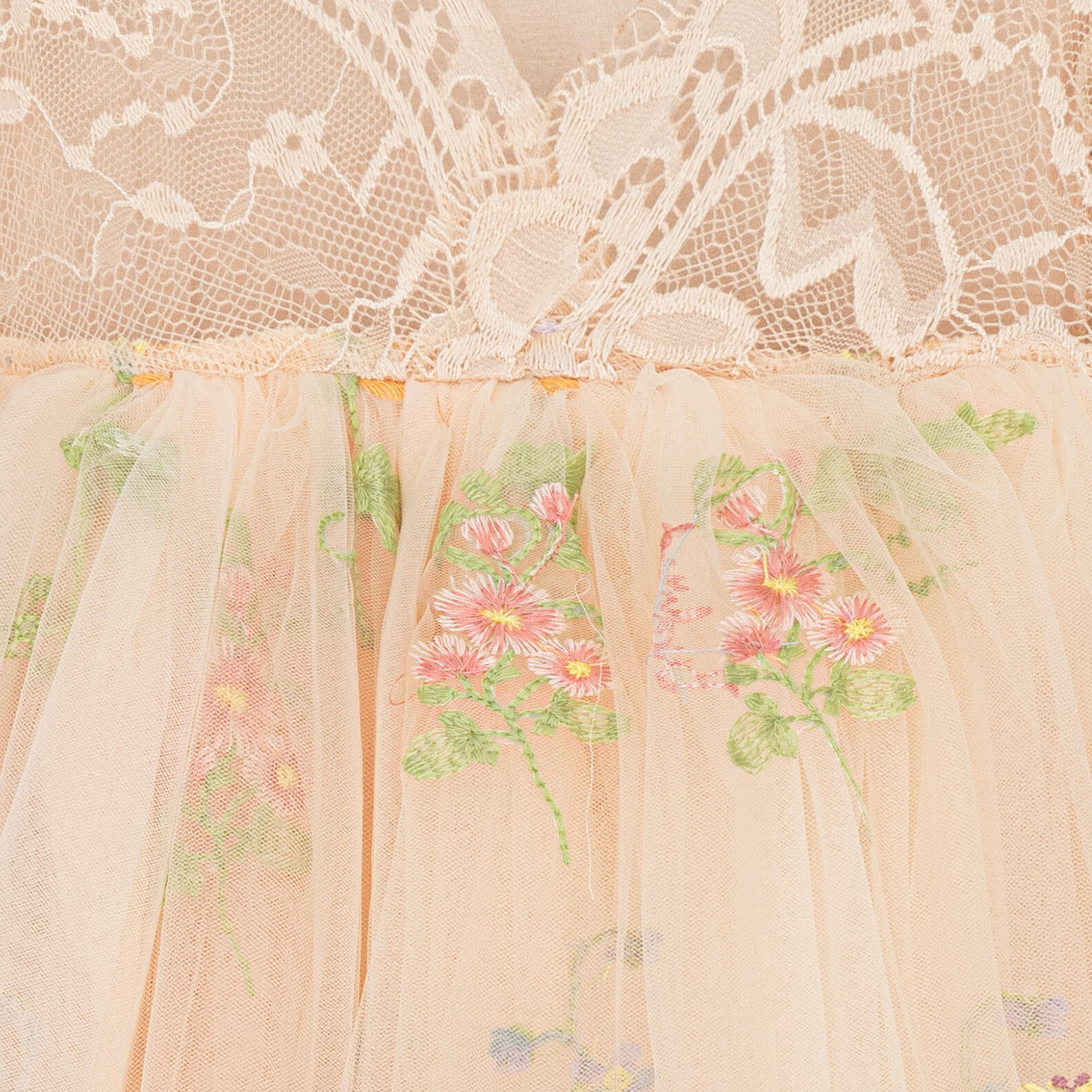 Apricot dress with embroidery detail