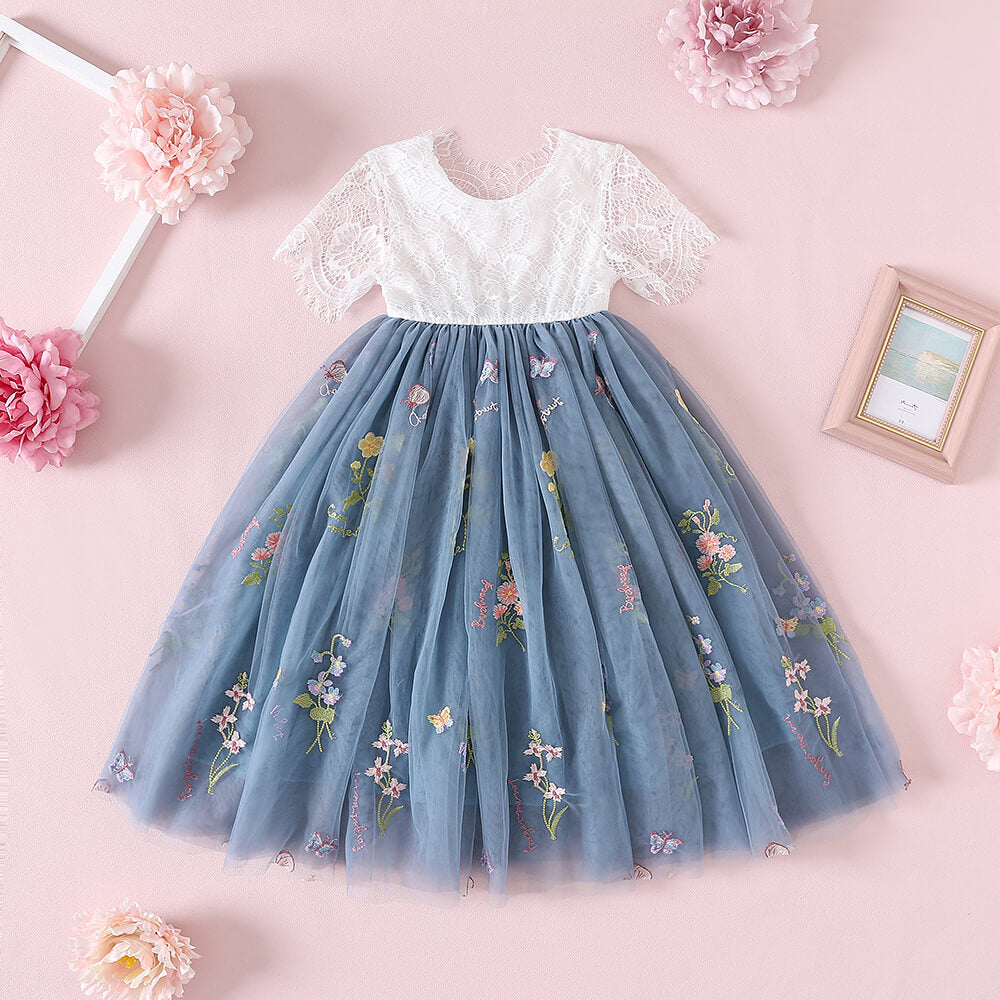 A beautiful lace and tulle flower girl dress in dusty blue