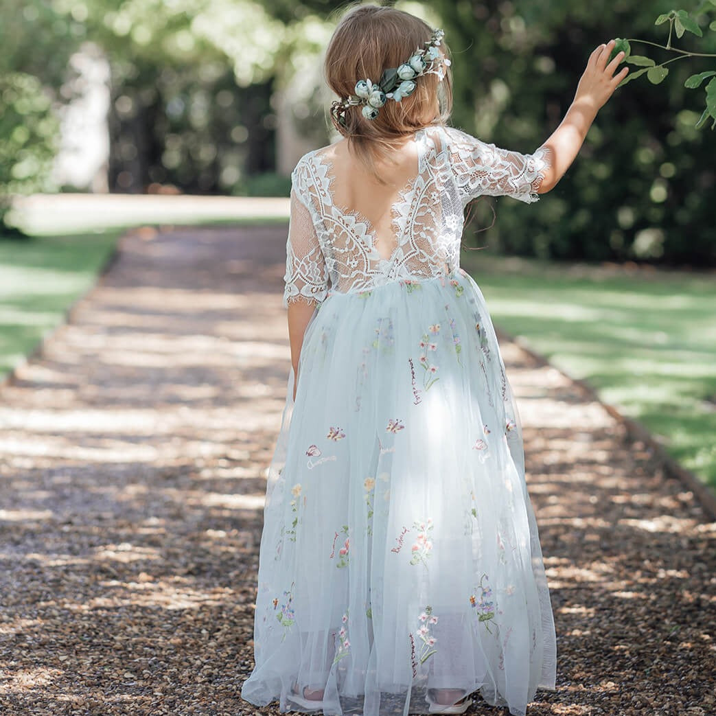 Beautiful flower girl in park 