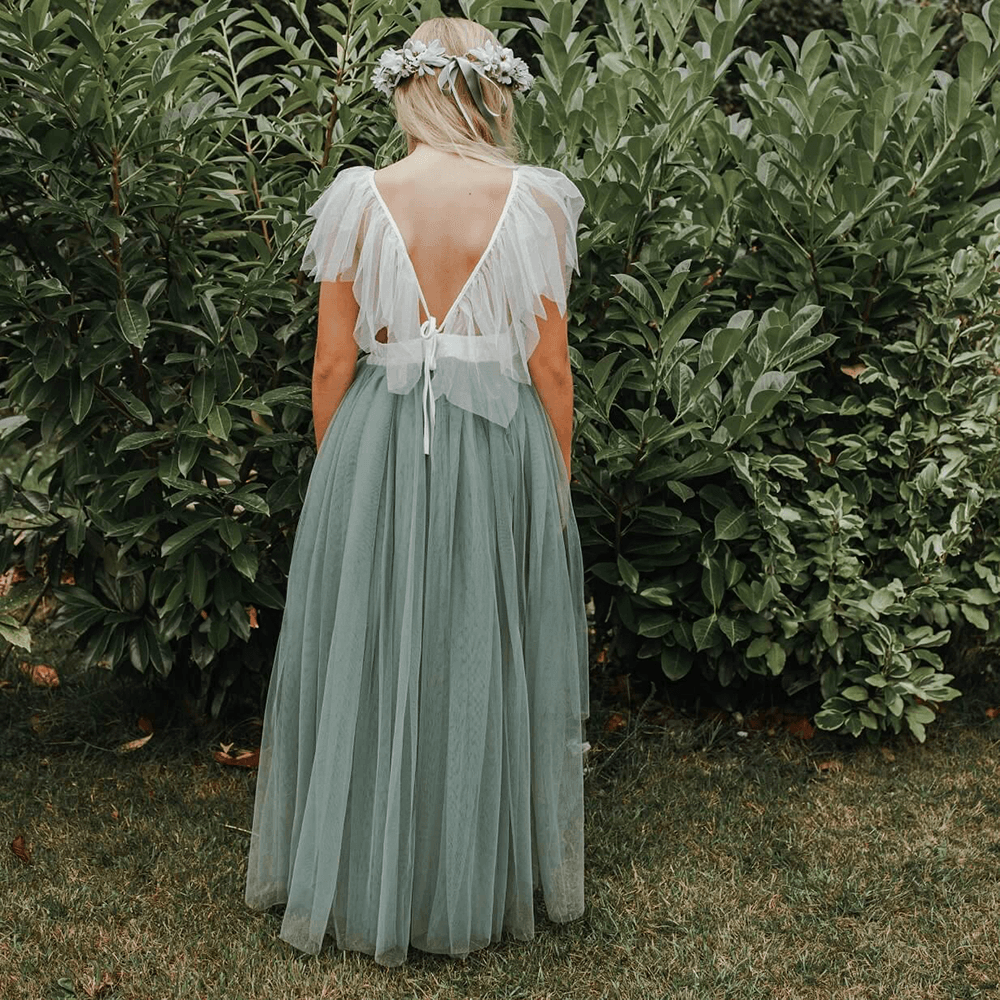 girl wearing a sage Bohemian Serendipity Dress