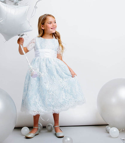 girl holding balloon